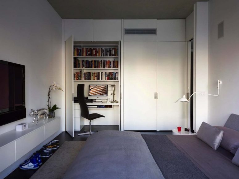 a practical home office in a bedroom's closet
