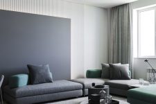 20 a minimalist living room spruced up with slate grey and green touches, furniture and accessories is a very chic space to be