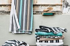 20 bright and fun coastal towels will bring a slight coastal or beachy feel to your space