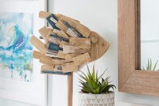 25 a cool coastal decoration – a fish made of reclaimed wood is a cool and fresh idea to bring a coastal feel to the bathroom