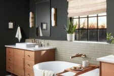 a stylish bathroom with black walls