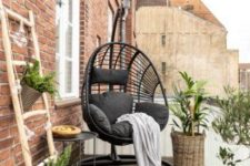a cozy summer balcony decor with potted plants