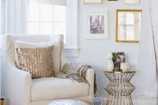 a super glam nook with mixed metals – a silver Moroccan pouf, a gold side table, a gold pillow, a floor lamp on a chromatic leg