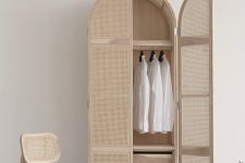 an ethereal-looking cane mini wardrobe is a beautiful lightweight furniture item is a chic idea for a modern space