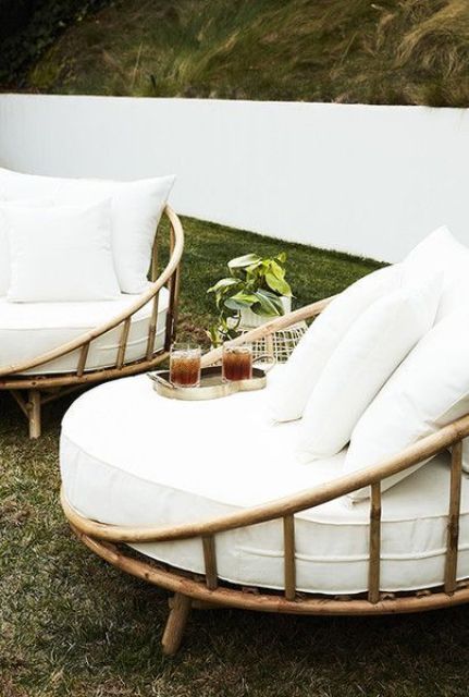 lovely rounded bamboo chairs with white upholstery are amazing for styling any outdoor space and look very elegant