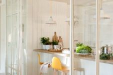 minimalist glass white sliding doors are ideal for separate a kitchen and a living room or some other room