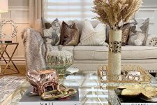 a slightly boho living room design with metal touches