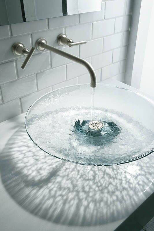 a chic clear glass vessel sink is a beautiful idea to enjoy those water waves and splashes and it looks lightweight and cool
