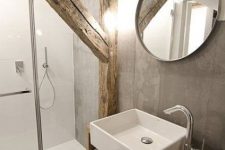 a minimalist bathroom but with exposed beams