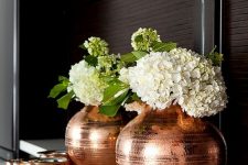a copper vase and jars are great for rocking them in your space, they give a soft and warm feel to the space