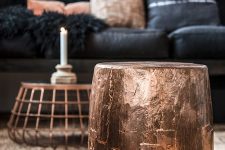 a side table covered with copper leaf and a coffee table with a copper base are very lovely decoraitons to rock