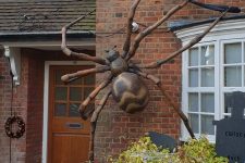 05 a giant and very realistic-looking spider will instantly make your house look very Halloween-like and you won’t need any other decor