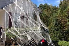 14 realistic spiderweb and realistic giant black and red spiders will make your house look very Halloween-like, you won’t need other decor