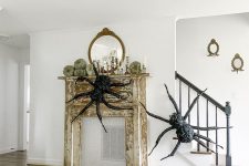 21 a duo of giant realistic spiders will easily turn your space into a Halloween one and will do that with style
