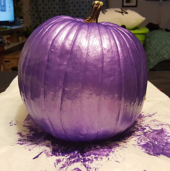 a metallic lilac pumpkin is a cute idea for Halloween decor and will do for pastel fall decor, too