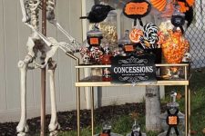 a stylish halloween bar cart