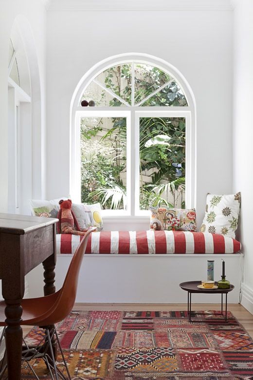 a cozy nook with a windowsill daybed