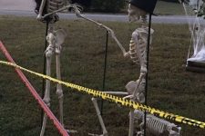 a romantic Halloween scene with skeletons proposing and some skeleton dogs is a very cool and lovely idea to rock