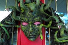 a scary medusa wreath with lots of snakes is a statement idea for Halloween front door decor