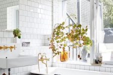 decorate your bathroom with fall leaf arrangements and some amber bottles – this is an easy way to embrace the season
