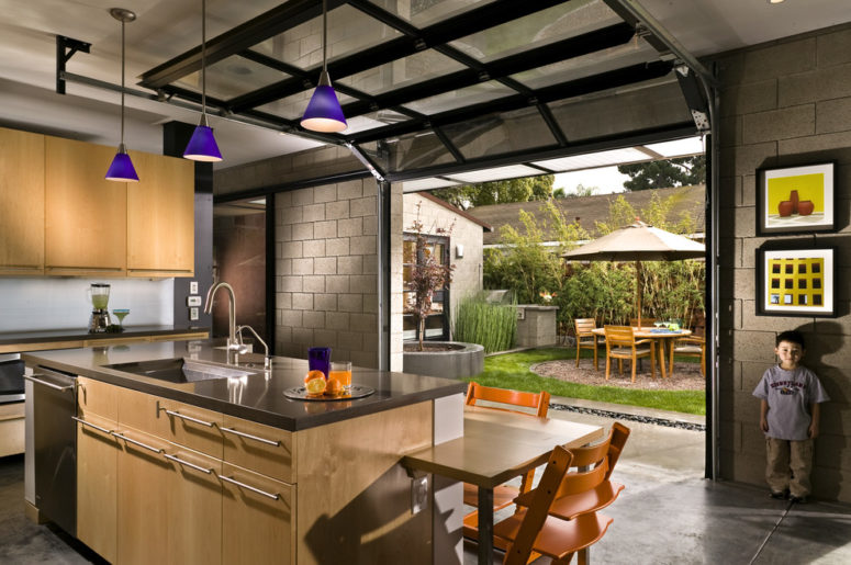 open your kitchen to the courtyard with a garage door to enjoy your meals outside or enjoy fresh air while doing things in the kitchen