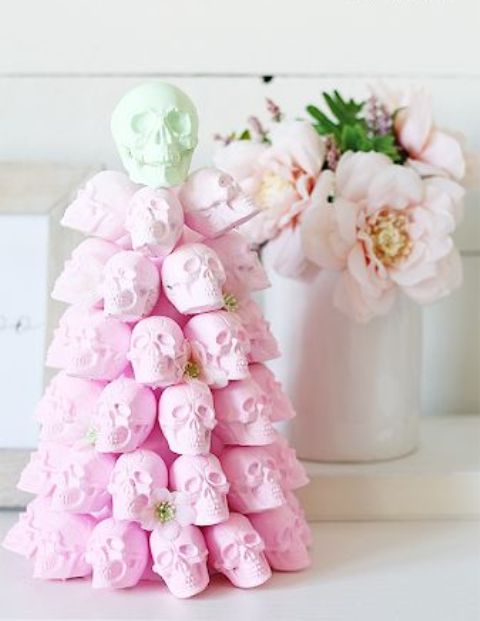 a pastel pink skull Halloween tree is an outstanding and extra bold idea that will catch all the eyes