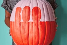 04 a matte pink and orange Halloween pumpkin with letters is a very cool and fresh idea to rock, simple and graphic