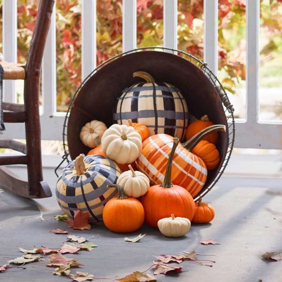 natural and plaid painted pumpkins are perfect for styling your home in a rustic way for fall, Halloween or Thanksgiving