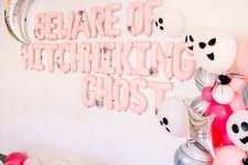 09 gorgeous pink Halloween styling with lots of balloons – pink, silver and scary ghost ones, pink balloon letters and a silver moon