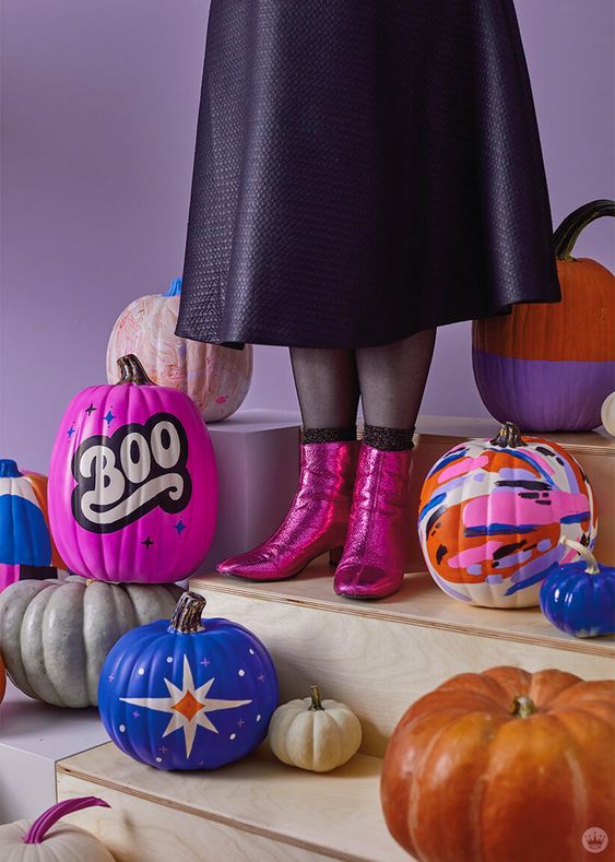 super bright and colorful pumpkins in bold shades in pink, blue and orange are amazing for your retro Halloween party