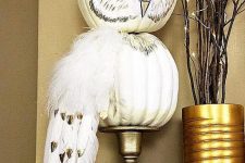 13 a fall pumpkin owl is a gorgeous decoration for a fall or Halloween space and it looks really fantastic