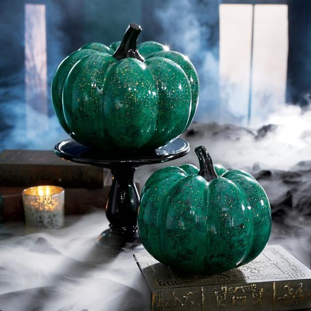 super elegant green marble pumpkins on stands will be a gorgeous solution for Halloween decor and you can DIy them easily
