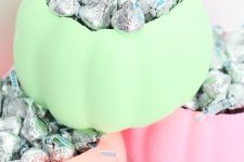 14 neon green, pink and blush pumpkin candy bowls are what you need to serve candies and other sweets at Halloween