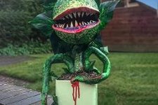 15 a bold and scary man-eating plant in a green planter is a fantastic decoration for your next Halloween party
