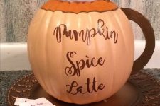 18 a beautiful idea to turn a pumpkin into a pumpkin spice latte with just painting and gluing some pieces is amazing