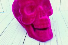 18 a hot pink velvet skull is a very cool solution for Halloween, a fresh take on traditional decor