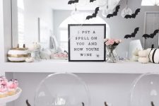 24 girlish Halloween decor with purple and pink velvet pumpkins and black hanging bats – these are all you need for Halloween