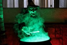 29 a witch at a cauldron with green smoke will be a nice and scary decoration for Halloween and is a great idea