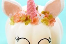 30 a white pumpkin styled as a little unicorn in a floral crown is one of the cutest ideas i have ever seen