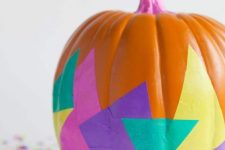 31 an orange pumpkin with a pink stem and super bold paper decoupage is a catchy idea for a colorful Halloween party