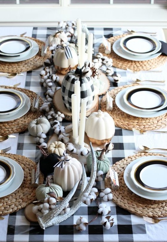 a lovely thanksgiving table setting with a buffalo check table runner