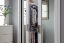 a bedroom with mirror pocket doors that hide the closet is an ideal option to hide your wardrobe and do it without spoiling the room style