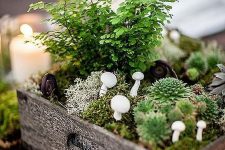 a rustic thanksgiving centerpiece with moss