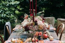 a fall floral centerpiece is a nice addition to a Thanksgiving table