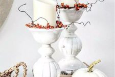 white Thanksgiving decor with white candleholders, white candles, twigs and berries is amazing and very chic