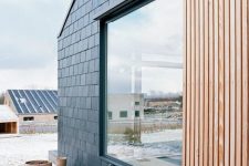 04 modern light-stained exterior wooden screens to keep the house private and to defend it from harsh weather conditions