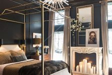 a cute bedroom with a faux fireplace is qutie cozy