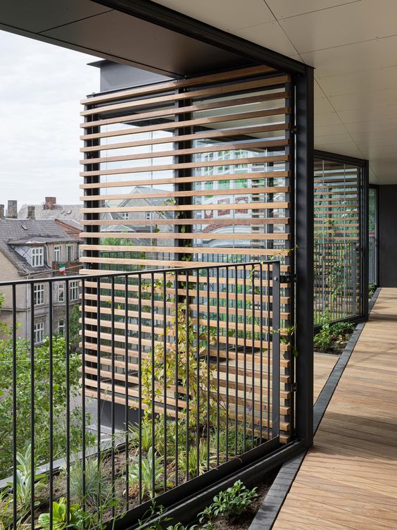 mini balconies covered with outdoor wood slab screens for more privacy and a bit less sunshine inside are amazing as a contemporary solution