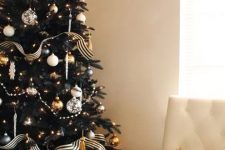 a cute black christmas tree for a neutral interior