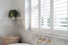 09 plantation shutters always work nice for bathrooms – they keep your space private and don’t block all the light